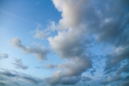 Blue sky background with tiny clouds.Sky clouds.Sky with clouds weather nature cloud blueの写真素材