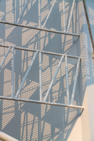 Metal stairs in a modern building, detail of a modern architecture.の写真素材