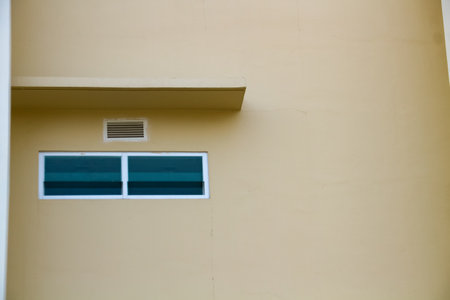 Modern window on the wall of the building, closeup of photoの写真素材