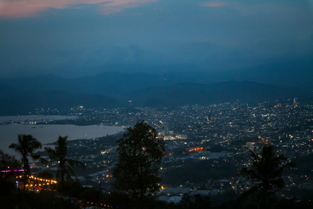 Night view of the city from the top of the mountain.の写真素材