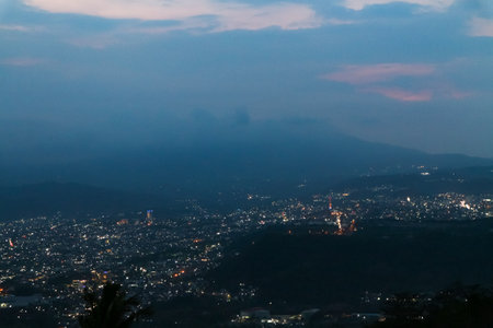 Night view of the city from the top of the mountain.の写真素材