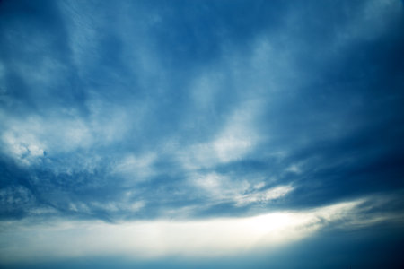 Blue sky with clouds and sun. Nature background. Abstract sky.