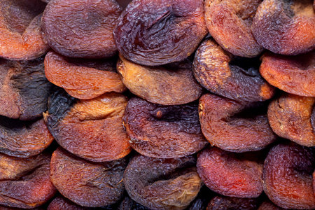 Heap of dried apricots backgroundの写真素材