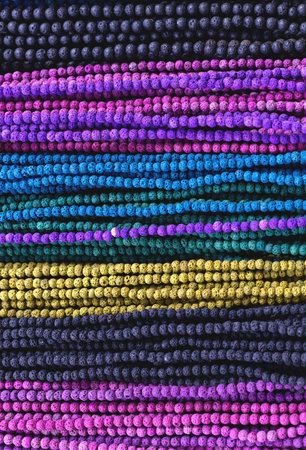 Background from colored beads. Colorful background.