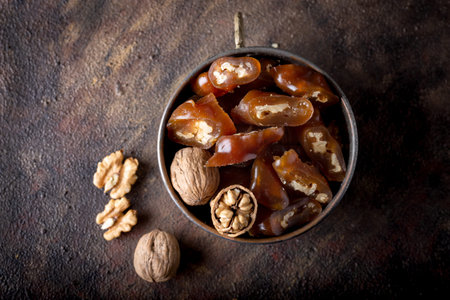 Churchkhela Pestil or Walnut Fruit Pulp in bowl on dark background.の写真素材