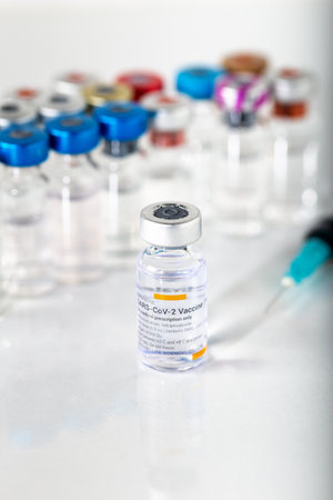 Izmir, Turkey -  01-26-2021: Sinovac Covid -19 vaccine vial and injection syringe isolated on white background.のeditorial素材