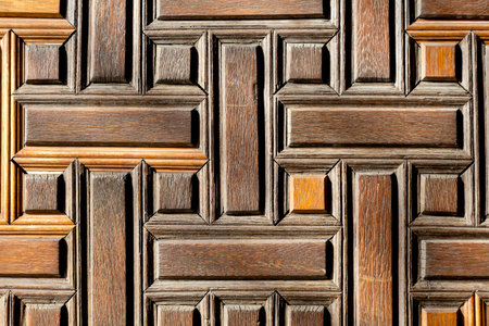 Wooden texture of a door in the Alhambra, Granada, Spain