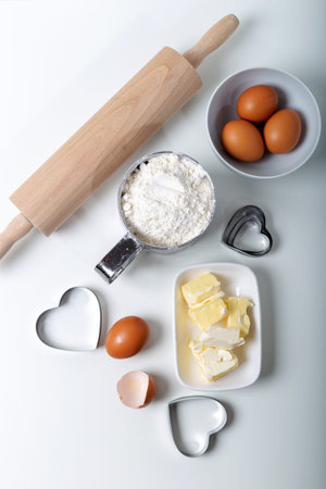 Food ingredients for bakery or homemade bread or pasta, olive oil, flour, eggs on white background....