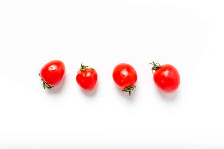 Fresh cherry tomatoes isolated on white background.の写真素材