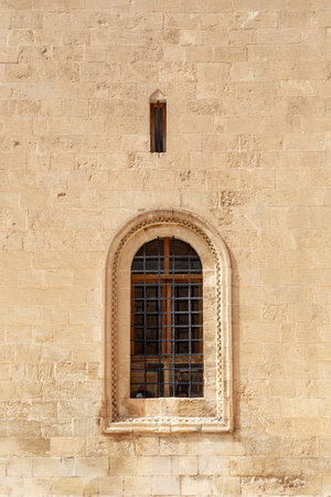 Window in the wall of the old city of Jerusalem, Israel.
