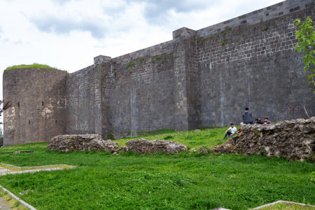 Diyarbakir - Turkey - 05-01-2019: Old City Walls in the city of Diyarbakir, Turkey. People walk around the city walls and rest.のeditorial素材