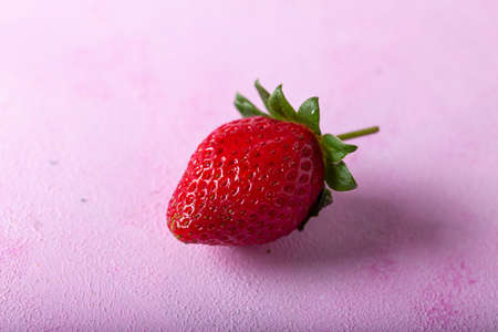 Fresh strawberry on pink background. Close up.の写真素材