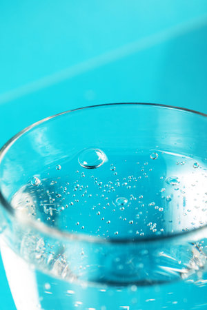 Glass of water with bubbles. Clean water for good health.