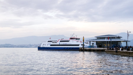 Alsancak, Konak, Izmir-Turkey - 03,04,2023: Passenger boat or ferry boat in Alsancak Pier at Izmir, Turkey.  Alsancak Ferry Station on Kordon Street in Izmir.のeditorial素材