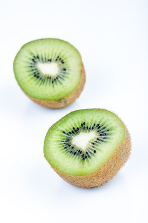 Kiwi fruit sliced segments isolated on white background. Close-up of slice kiwi fruit isolated on white background.の写真素材