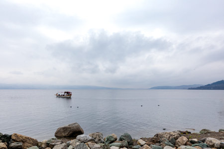 Lake Sapanca, Turkey, in a cloudy day in winter. Calm lake scene with overcast skies.