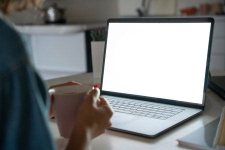 Mockup on laptop with woman watching movie, app on it.