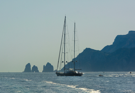 Silhouette of Faraglioni cliffs, Capri island, Italyの写真素材
