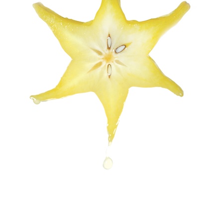 Close up view of the carambola on the whiteの写真素材