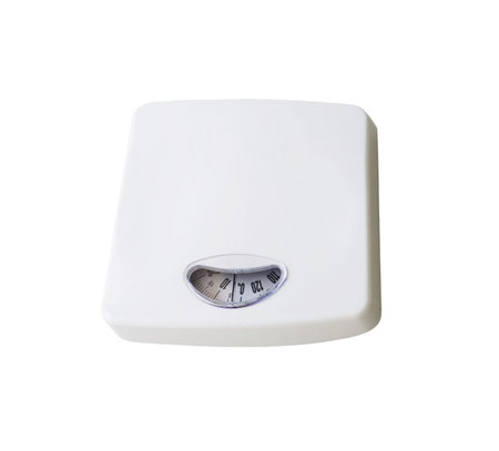 Dieting concept with scales isolated on the whiteの写真素材