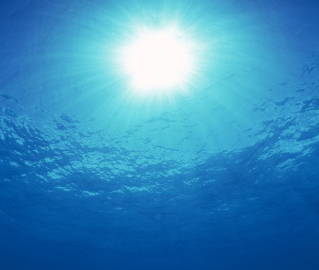 Underwater Scene with sun rays abstract with water and sun raysの写真素材