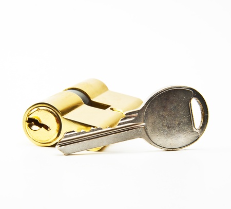 Lock and key isolated on white backgroundの写真素材