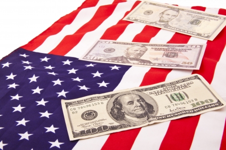 dollars on american flagの写真素材