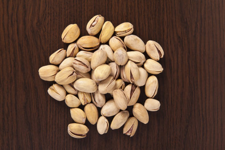 shelled pistachio on wooden