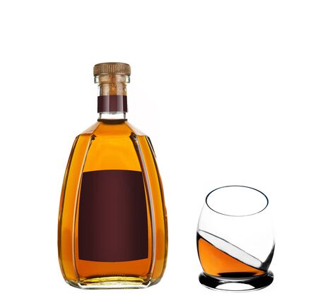 Whiskey bottle and a whiskey glassの写真素材