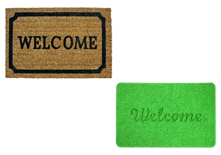 Welcome mats isolated over whiteの写真素材