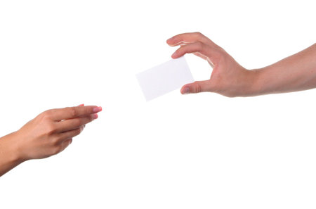 Man and woman hands passing each other a business card