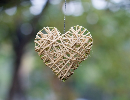 Wooden heart shaped figureの写真素材