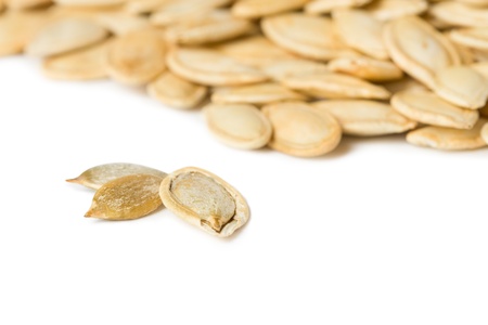 Pumpkin seeds isolated on the white backgroundの写真素材