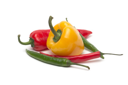 Chili and bulgarina pepper isolated on white background