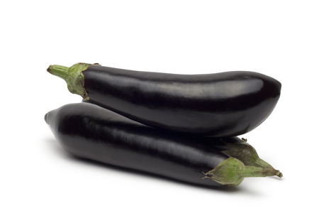 eggplant or aubergine vegetable on white backgroundの写真素材