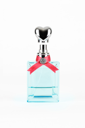 women's perfume in beautiful bottle isolatedの写真素材