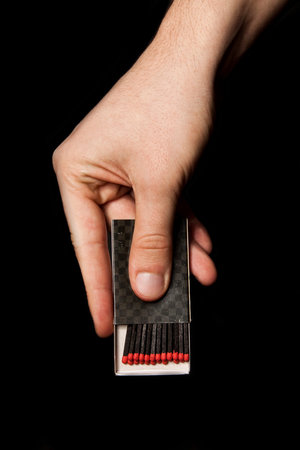 Box of matches in the man hand