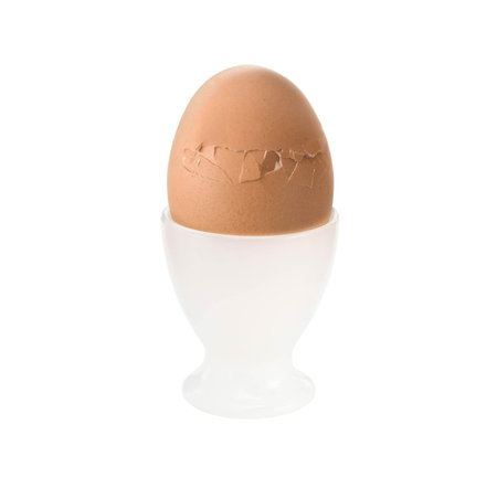 Single brown chicken egg isolated on white