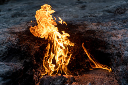 Everlasting or eternal fire called Yanartas by mount Chimera which is near to Olympos in Antalya. Burning rocks due to constant natural gas leaks.の写真素材
