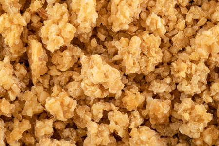 Close up photo of traditional turkish food made of tomato flour red pepper and yoghurt called "tarhana"on isolated background.の写真素材