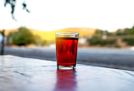 Close up photo of hot turkish tea in an glass cup.の写真素材