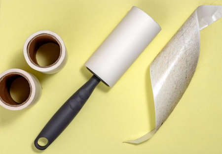 Sticky lint roller and cat hairsの写真素材