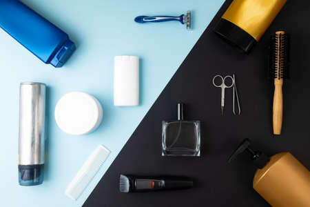 Various cosmetic stuff for men on passtel blue background. Toiletry kit or setの写真素材