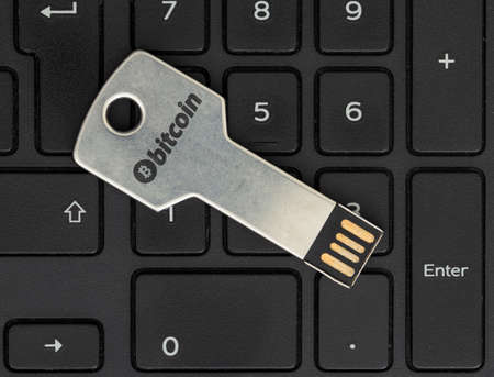 Key shaped flash disk inserted to a lapto. Concept of Cyber security on internet.の写真素材