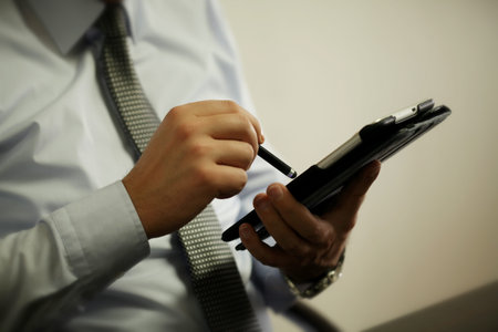 Businessman use tablet in the office.