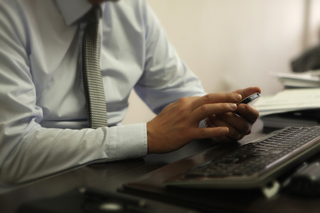 Man using using smartphoneの写真素材