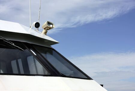 boat resting inside the harbor at low tideの写真素材