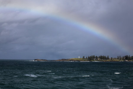 rainbow over the ocean landscapeの写真素材