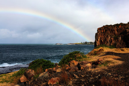 rainbow over the ocean landscapeの写真素材