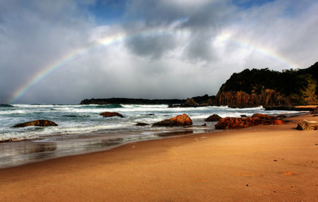 rainbow over the ocean landscapeの写真素材